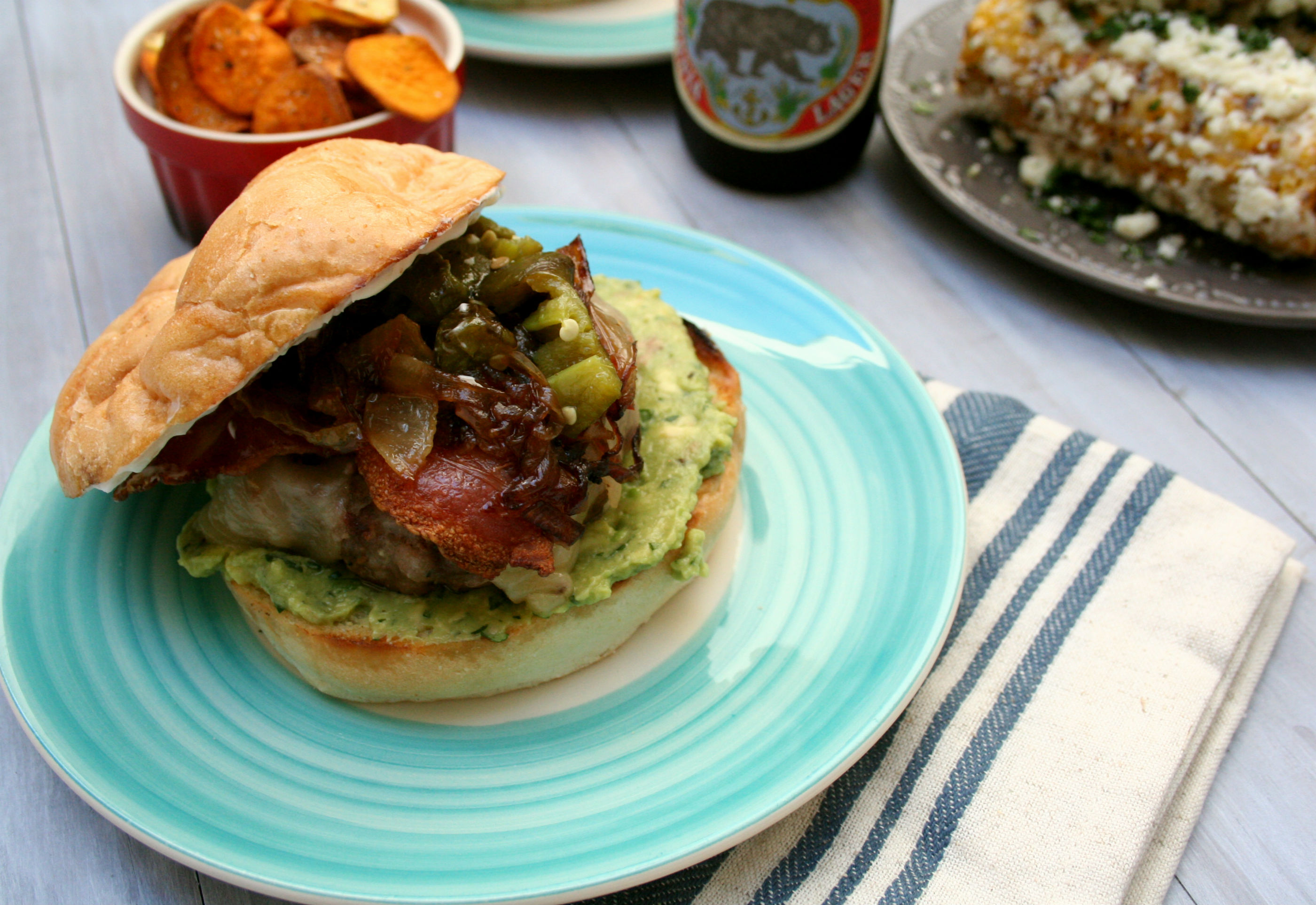 Bacon Burger with Roasted Jalapenos, Caramelized Onions, Guacamole